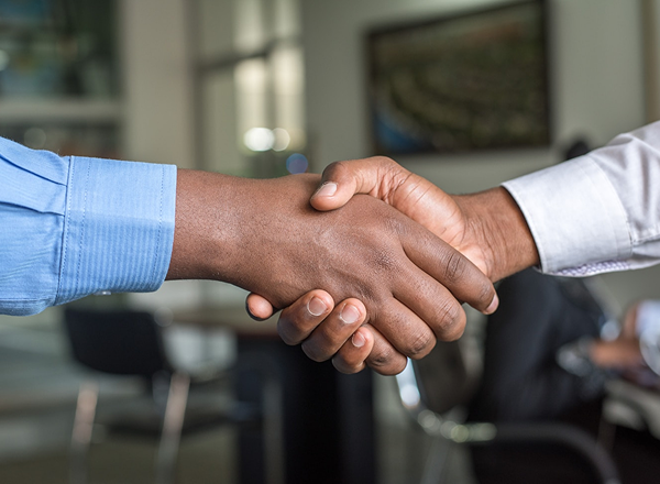 A closeup of people shaking hands